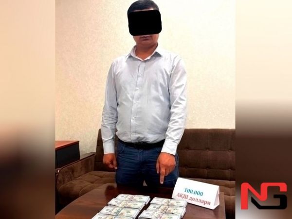 Тошкент вилоятида банк ходими $100 минг пора олаётганда ушланди