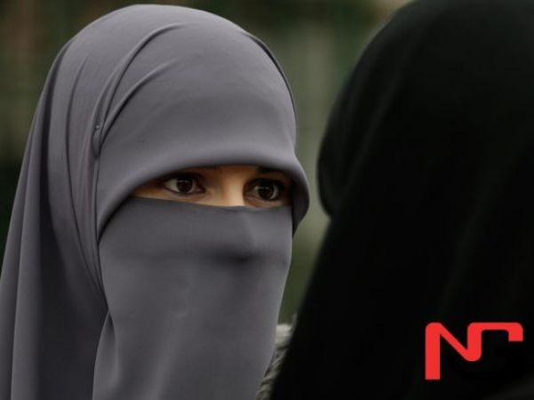 Жамоат жойларида юзни тўсиб юришни тақиқловчи қонун Сенат томонидан маъқулланди