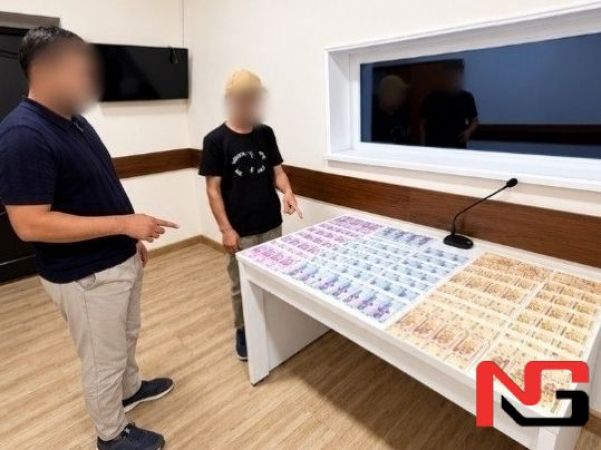Наманганда 51,5 млн сўм қалбаки пулни сотаётганлар ушланди